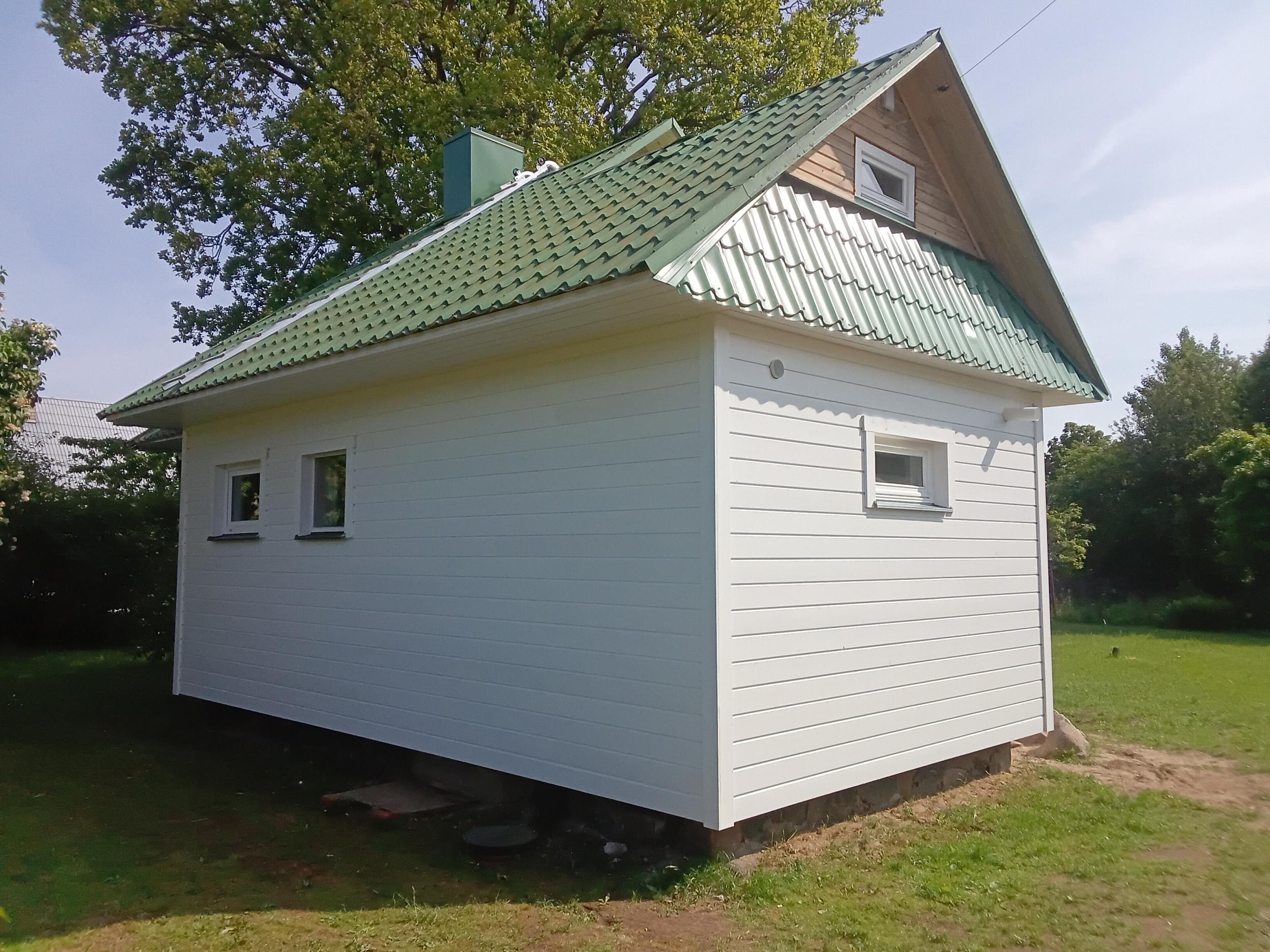 Suvemaja fassaadi soojustus ning laudise paigaldus